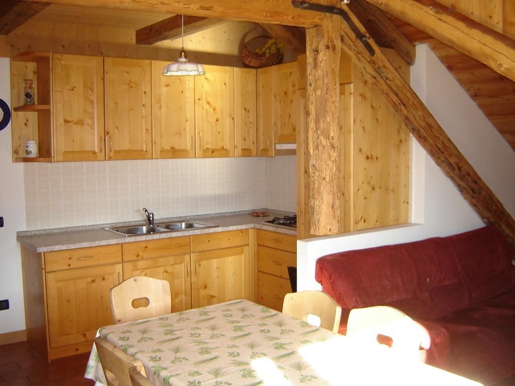 Residenza Domino Aparthotel Селва ди Кадоре Стая снимка